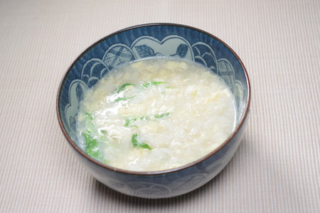Porridge with beaten eggの写真素材