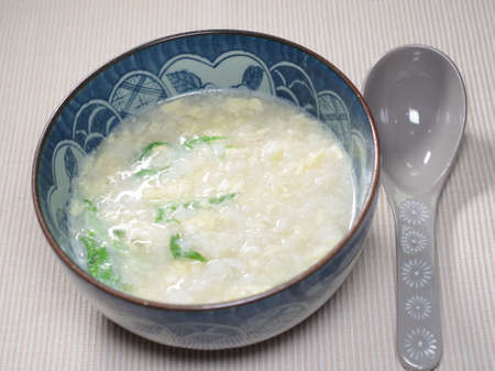 Porridge with beaten eggの写真素材