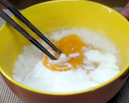 Porridge with half-boiled eggの写真素材
