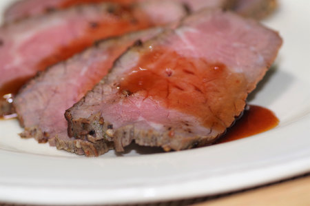 Cut roast beef on the plateの写真素材