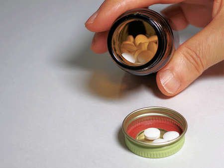 The pill is in the medicine bottleの写真素材