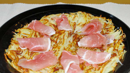 Potato galette with prosciuttoの写真素材
