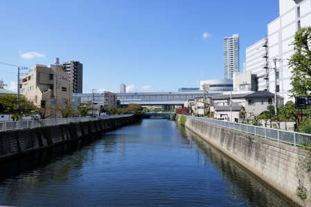 Cityscape beyond the riverの写真素材