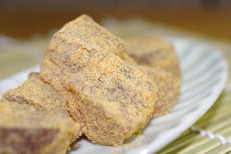 Warabimochi coated with soybean flour