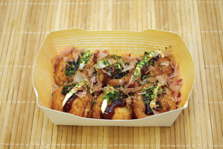 The dish contains takoyaki.の写真素材