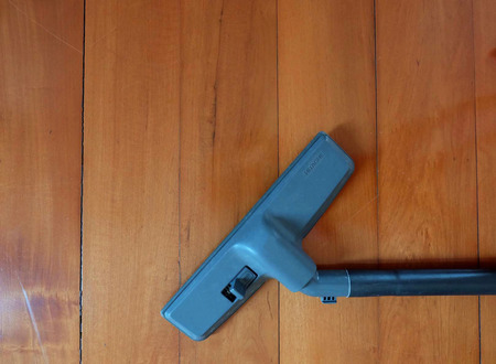 The Vacuum and wood backgroundの写真素材