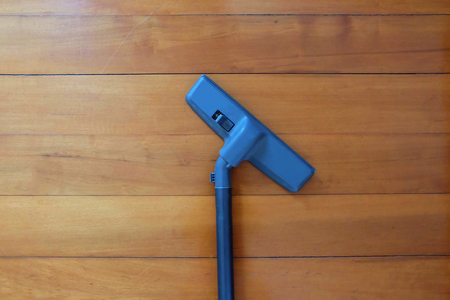 The Vacuum and wood backgroundの写真素材