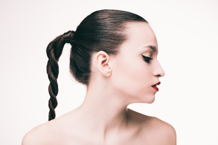 Sensual portrait of brunette isolated on whiteの写真素材