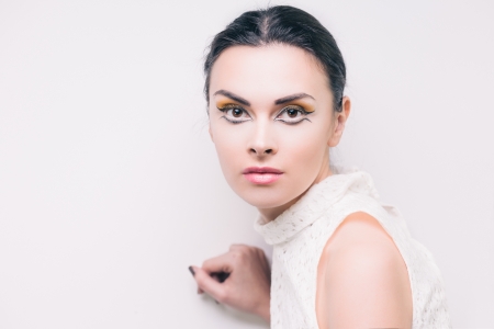 Fashion portrait of young girl with bright makeupの写真素材