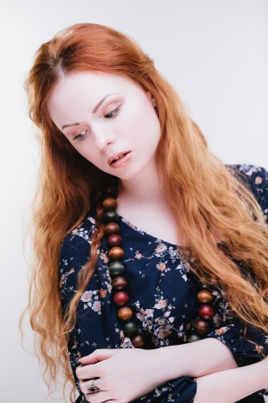 Sensual fashion portrait of young redhead girl with long hairの写真素材