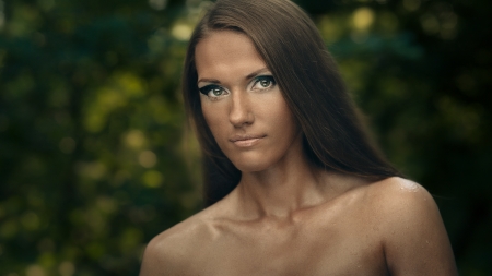 Art portrait of young woman in forestの写真素材
