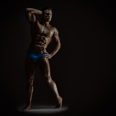 Artistic portrait of young handsome muscular manの写真素材