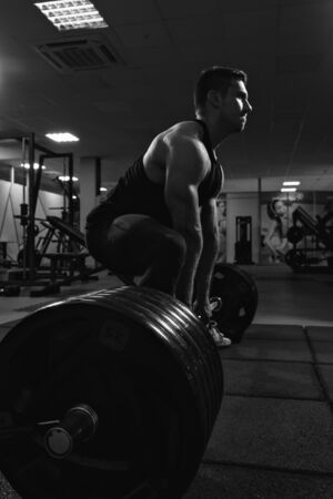 Young man powerlifter preparing for deadliftの写真素材