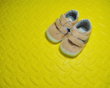 Baby shoes on Rubber sheet Rubber pads, cushions, pads, cushionsの写真素材