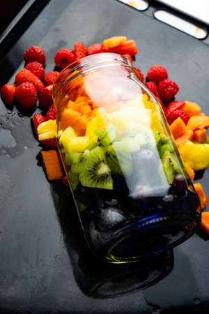 Fresh fruit salad in glass jar.の写真素材
