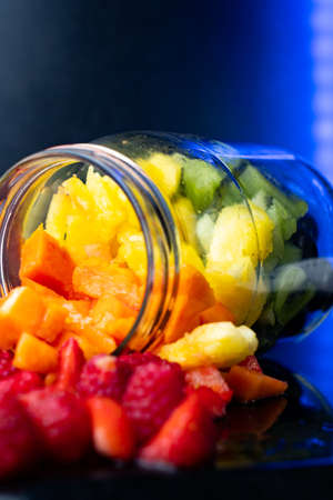 Fresh fruit salad in glass jar.の写真素材