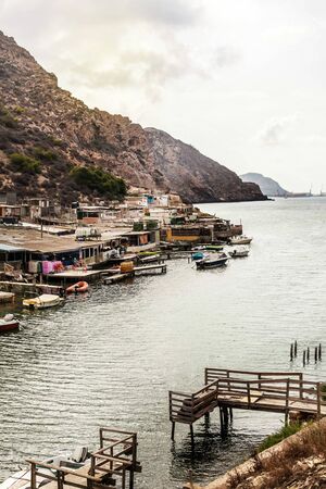 Sailboat and gull on the blue deep sea or oceanの写真素材