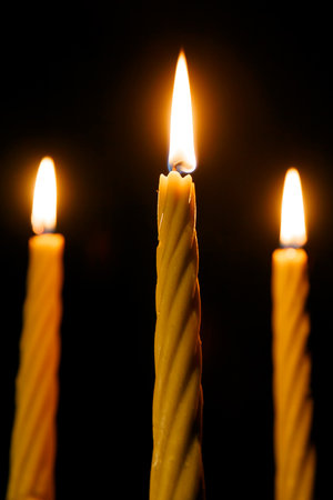 Bright Burning Candle in the Darkness. Remembrance and Memorial Day Symbol.