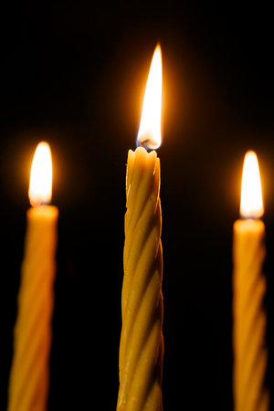 Bright Burning Candle in the Darkness. Remembrance and Memorial Day Symbol.