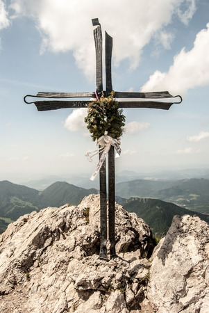 cross on Velky Rozsutec hill summit in Mala Fatra mountainsの写真素材