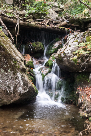 waterfall on Prudky potok stream bellow Susina hill in Kralicky Sneznik mountainsの写真素材