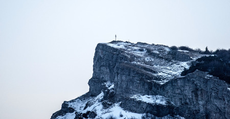 rocky limestone Klak hill in Mala Fatra mountains in Slovakia during winter early morning with clear skyの写真素材