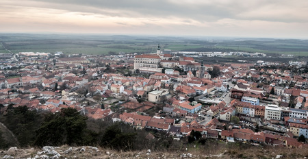 panorama of historical Mikulov city from Svaty kopecek hill in Palava mountains in South Moraviaの写真素材