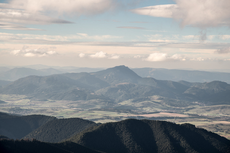 Chocske vrchy with highest Velky Choc hill and Oravska Magura mountain ranges from Polana hill in autumn Nizke Tatry mountains in Slovakiaの写真素材