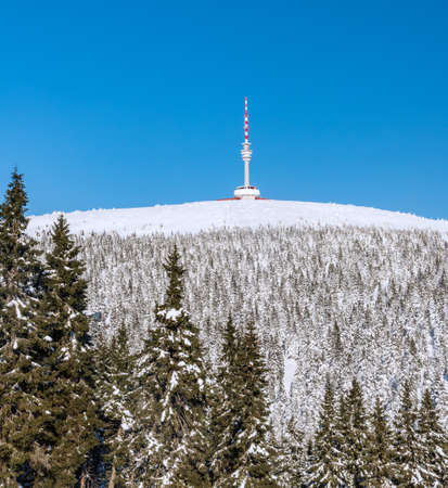 Praded hill in Jeseniky mountains in Czech republic during winter day with clear sky