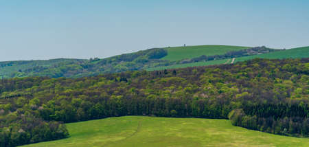 Zalostina hill in Biele Karpaty mountains from meadow above Javornik village in Czech republic during beautiful springtime dayの写真素材