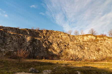 Former limestone quarry on Kamenarka hill above Stramberk town in Czech republic during beautiful autumn dayの写真素材