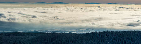 Moravskoslezske Beskydy, Mala Fatra and part of Tatra mountains from Praded hill in winter Jeseniky mountains in Czech republicの写真素材
