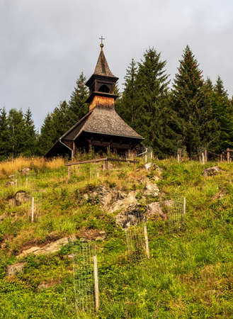 Chapel of St. Hedviky wooden chapel above Vidly village in Jeseniky mountains in Czech Republicの写真素材