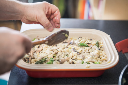 Spaetzle german baked gnocchi with chicken meat, champignons mushrooms, asparagus and cheese