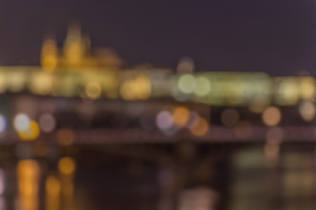 Prague panorama, abstract bokeh background. Concept of historical city at night.の写真素材