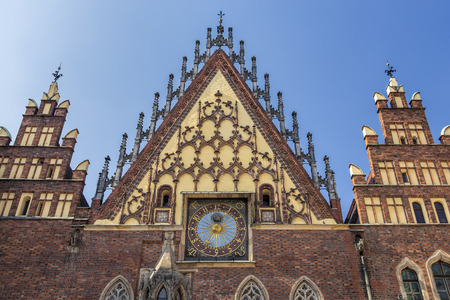 Detail of historic City Hall building in Wroclaw with sundial. Wroclaw old and a very beautuful city in Poland.の写真素材