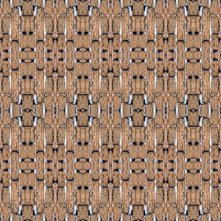 Seamless abstract architecture design for background, wallpaper, print or any use based on rustic wall of raw adobe bricks. Antique pattern resembling decorations on ancient architecture.の写真素材