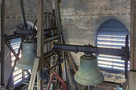 Two bells in an tower of old church.の写真素材