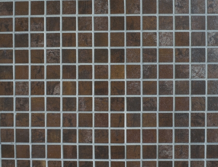 a wall of brown tiles usable as backgroundの写真素材