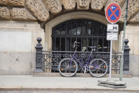 bike is secured on fenceの写真素材