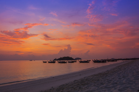 Silhouette sea sunlight fishboatの写真素材