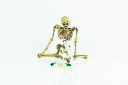 skeleton with blur drug dangerous and injectionの写真素材