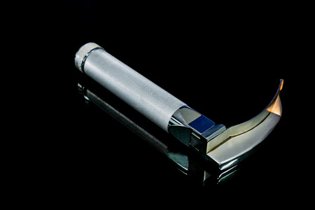 laryngoscope onblack shadow backgroundの写真素材