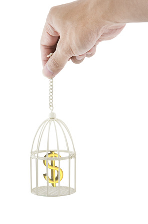 Man hand catch symbol dollar money in the white cage add clipping pathの写真素材