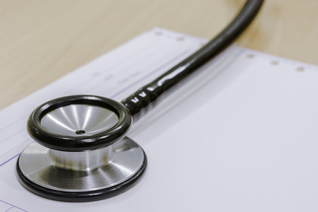 select focus of diaphragms stethoscope on blur paperの写真素材