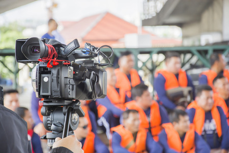 black vedio camera record people and blur backgroundの写真素材