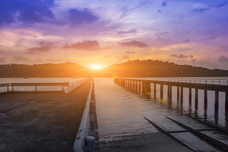 Landscape of bridge in the port between sunset silhouettesの写真素材