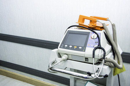 stethoscope on the EKG and AED monitor in emregency roomの写真素材