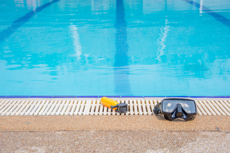action camera and mask nearside the pool swimmingの写真素材