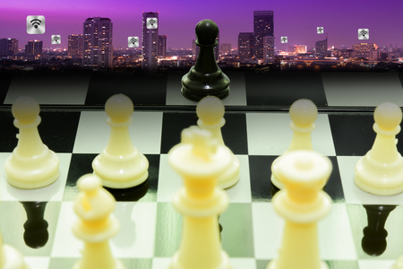 one black pawn fight team white chess concept business leadership and teamworkの写真素材